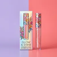 View: Pastel iridescent lip gloss carton printed with floral artwork standing beside a shimmering gloss tube