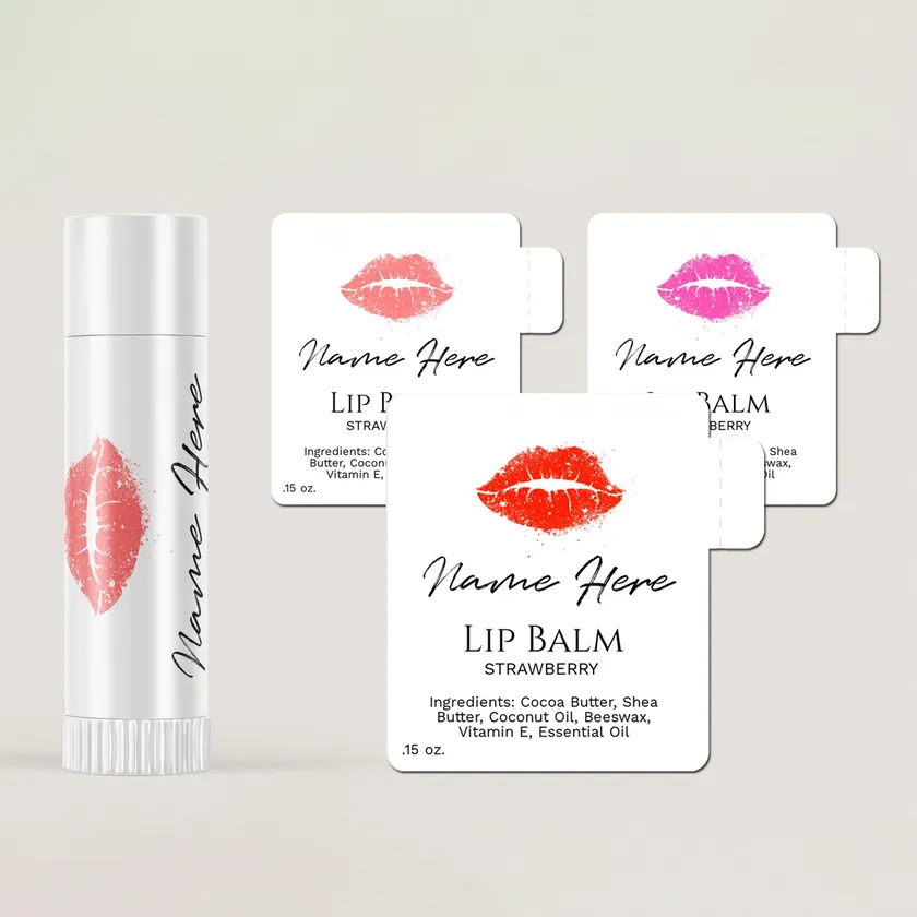 Three die-cut lip balm wrap labels with a lip print, beside a blank white lip balm tube