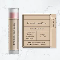 View: Kraft paper lip balm label printed in black beside a matching kraft-wrapped tube on marble