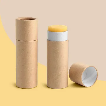 Three natural kraft paper lip balm tubes, one open showing the white inner liner