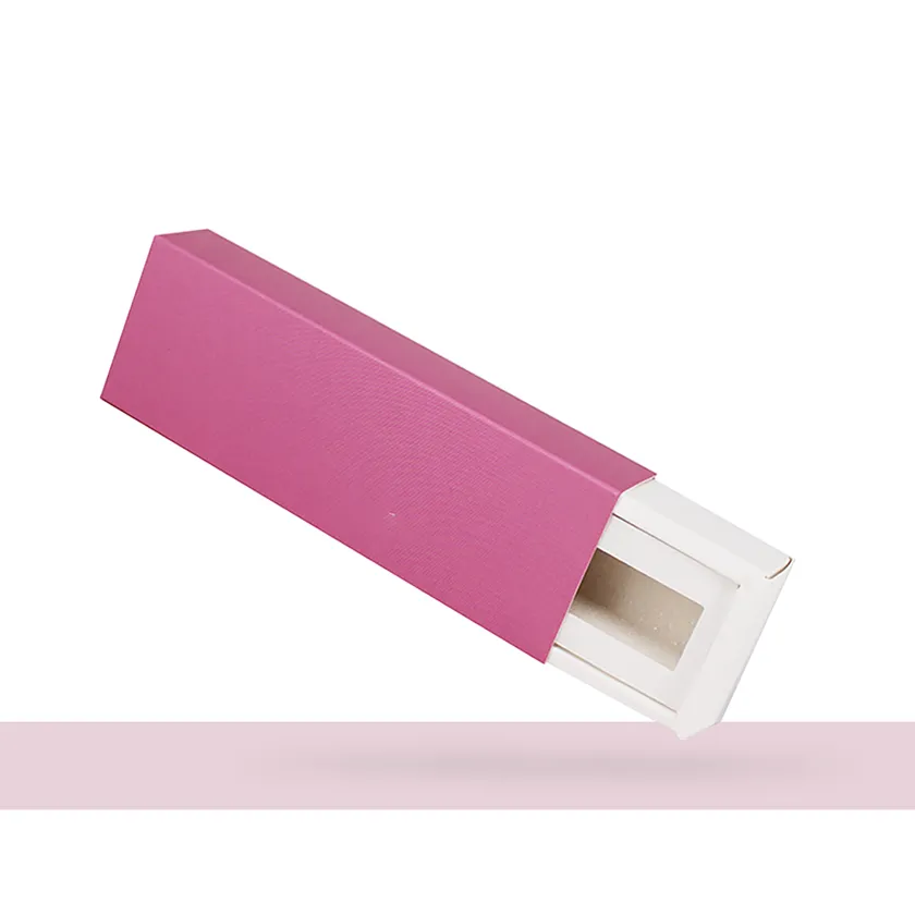 Pink rigid drawer box for lipstick half open, showing the white inner tray sliding out of the outer sleeve